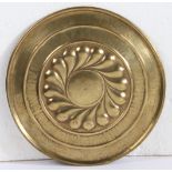 A brass alms dish type plaque, Nuremberg, probably 16th century Of slightly domed circular form,