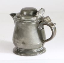 A George III pewter domed-lidded spouted measure, possibly Bewdley, circa 1770 Having a squat