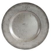 A late 17th century pewter multiple-reeded broad rim charger, circa 1700 The rim struck with four