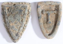 Two 14th to 16th century lead trade weights, English Each of shield-shape, one cast with the