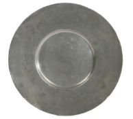 A 17th century pewter broad-rim plate, French With plain rim, the rear with the touchmark of Jonas