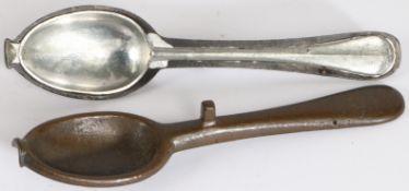 A George III bronze-alloy spoon mould, circa 1760 Typically in two parts, scratch ownership initials