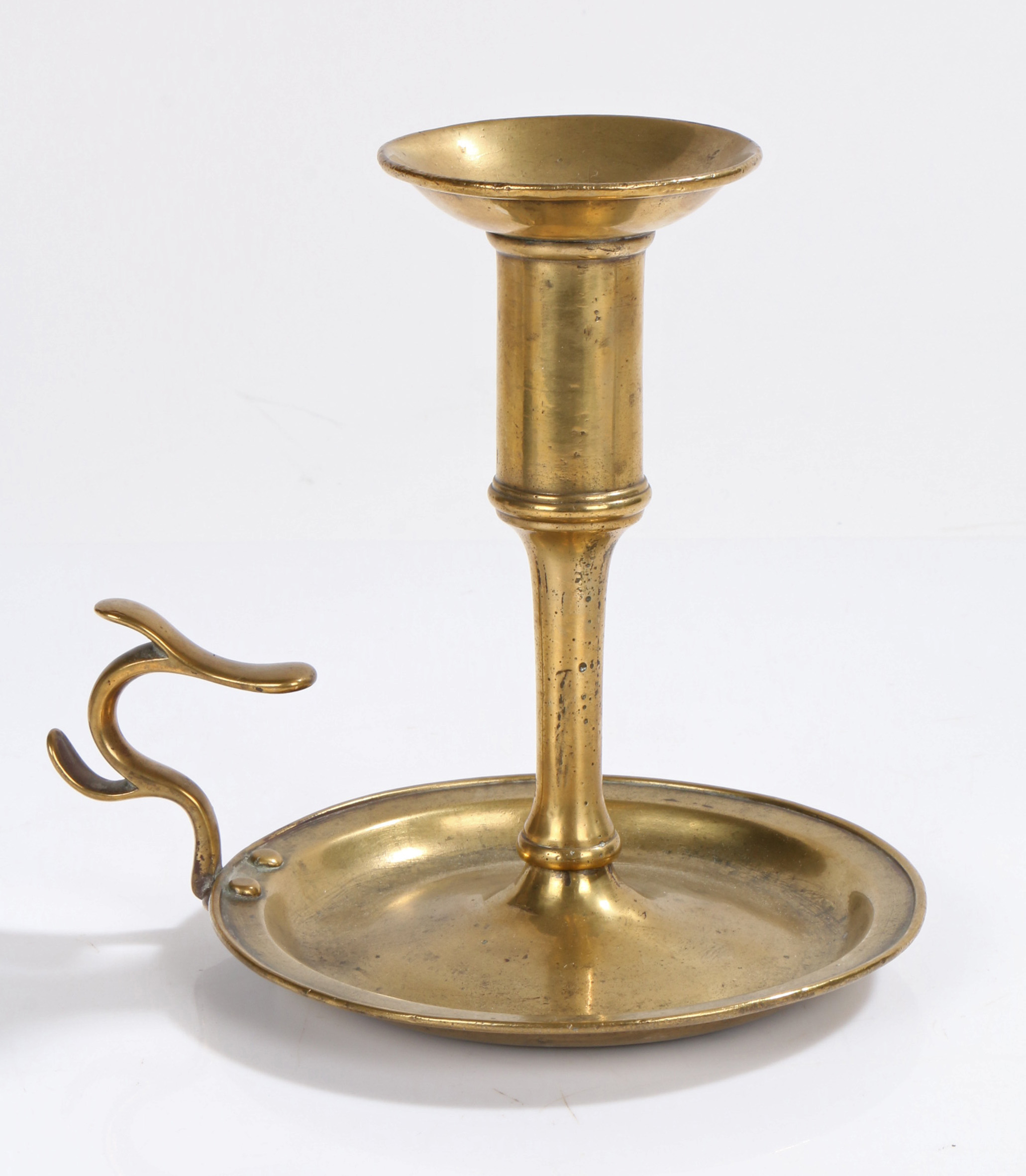 An unusual George III brass chamberstick, circa 1770 Having a tall socket with large flared rim - Image 2 of 2