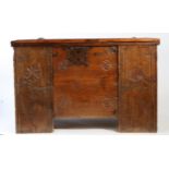 A 17th century, or possibly earlier, pine clamp-front chest The lid of three boards with moulded