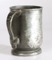 A George II pewter pint U-shaped mug, attributed to Wigan, circa 1740 Having a simple lip above a