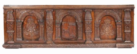 The Wolseley Hall Overmantel: A rare Elizabeth I carved oak overmantel, circa 1580, with family coat