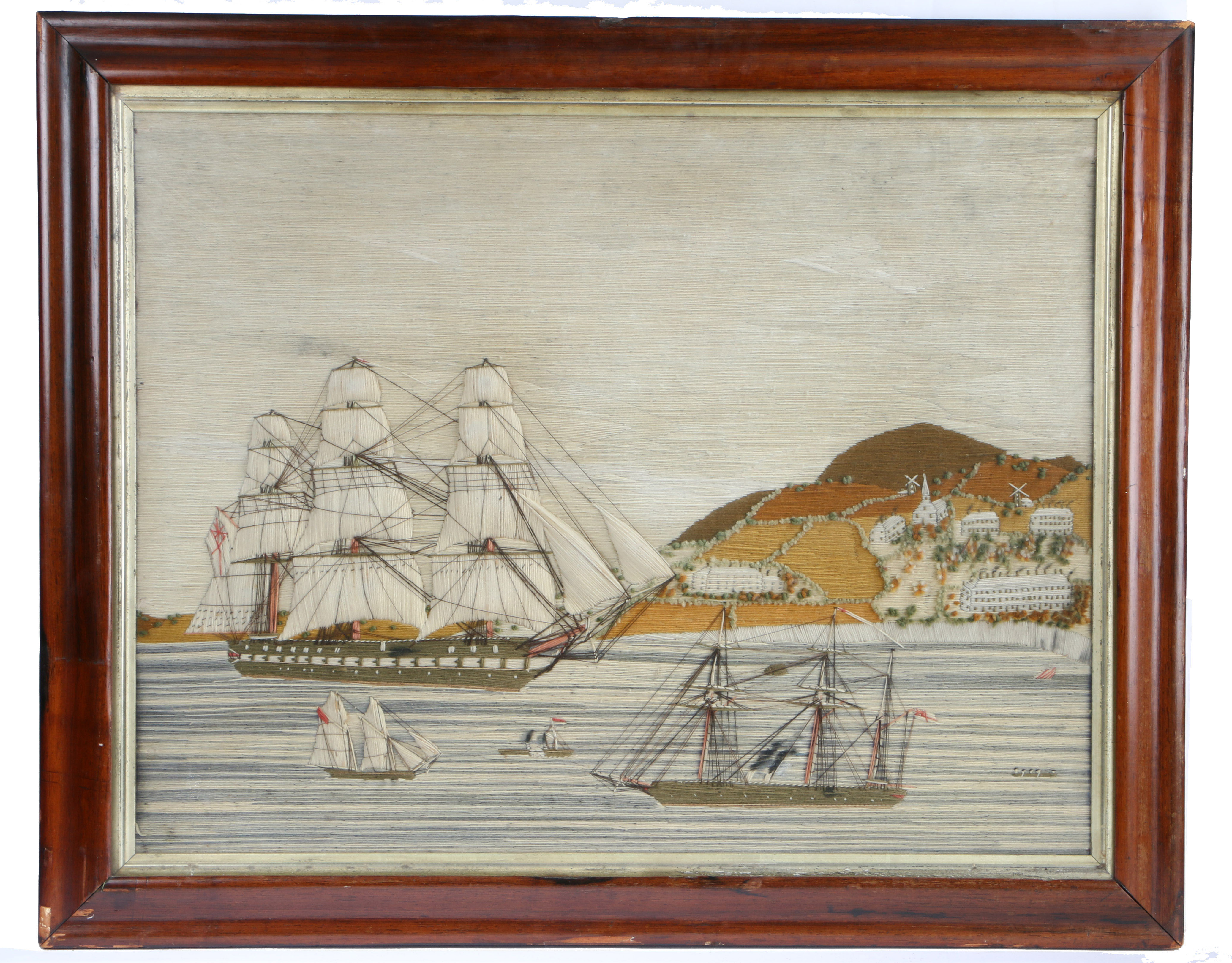 A Late 18th/19th century wool work embroidery picture depicting a military three mast ships off - Image 2 of 2