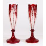 A pair of late 19th century Bohemian tulip vases, circa 1880, having red stained and floral