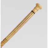 A 19th century whalebone walking stick, having a inlaid handle above a reeded and spiral carved