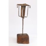 Iron and timber hanging lamp holder, possible for cruise lamps, with a platform and cage above a