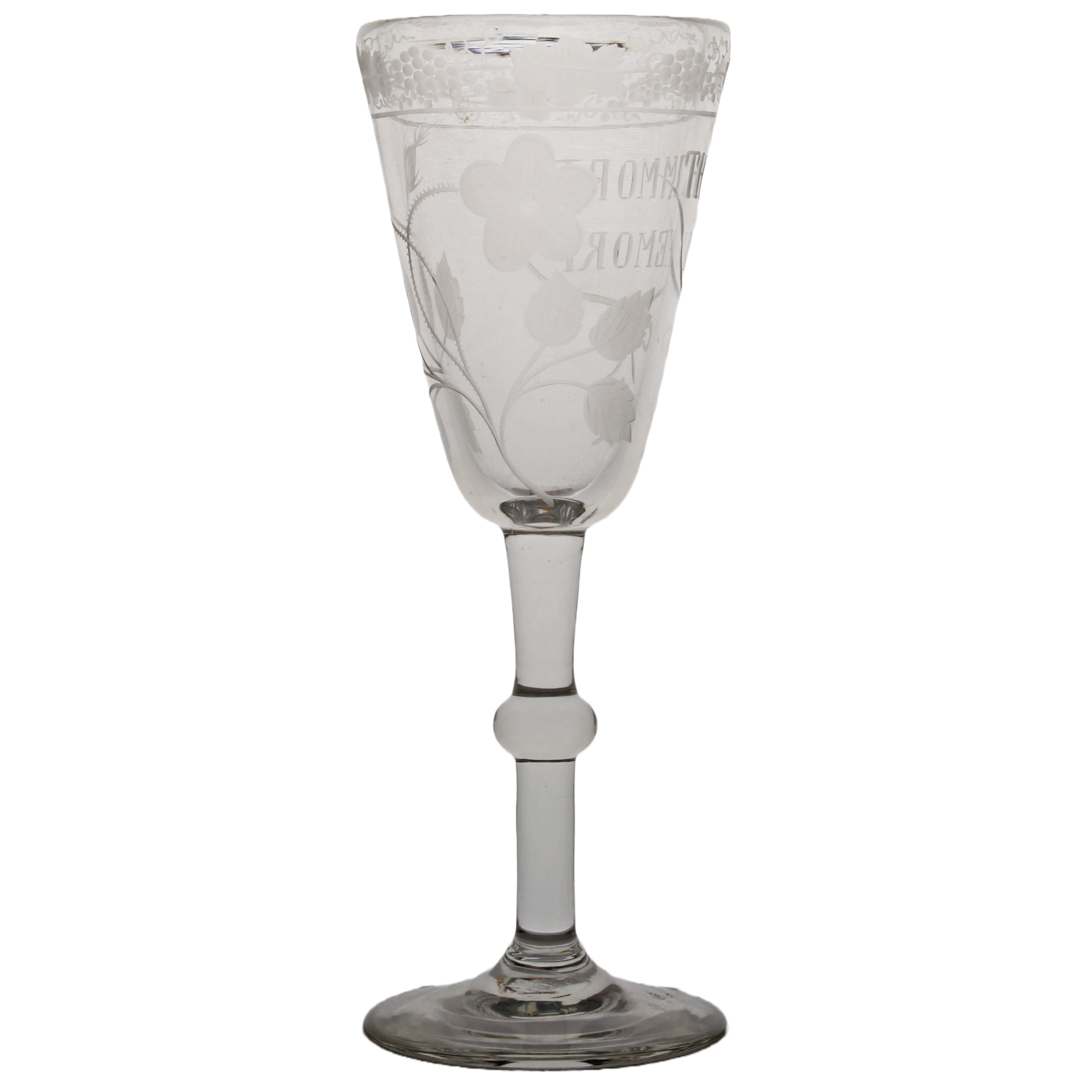 An early 19th Century glass, The Immortal Memory engraved to the bowl and trailing grape and vine