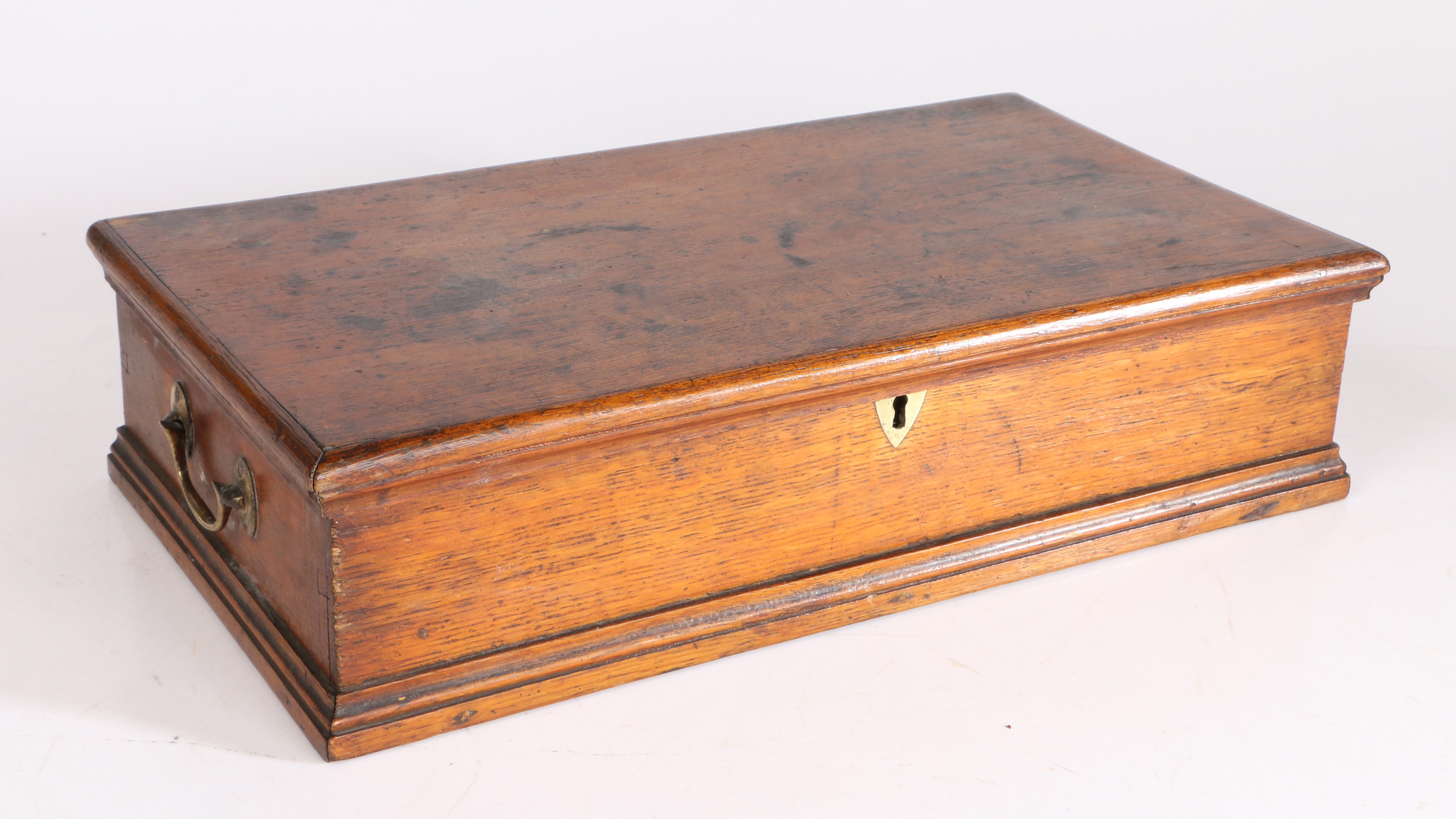 A Victorian oak till box, the rectangular hinged top above two faux single drawers to either side,