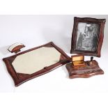A 20th Century desk set, with a blotter, frame, pad, ink well, (5)