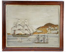 A Late 18th/19th century wool work embroidery picture depicting a military three mast ships off