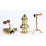 A George III brass castor, baluster shape, 14cm high, together with a small goffering iron stand,