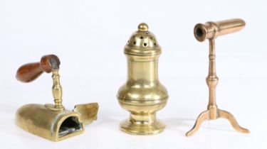 A George III brass castor, baluster shape, 14cm high, together with a small goffering iron stand,