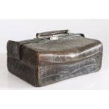 A 19th century crocodile skin vanity case, having a carrying handle to the top, 29cm wide