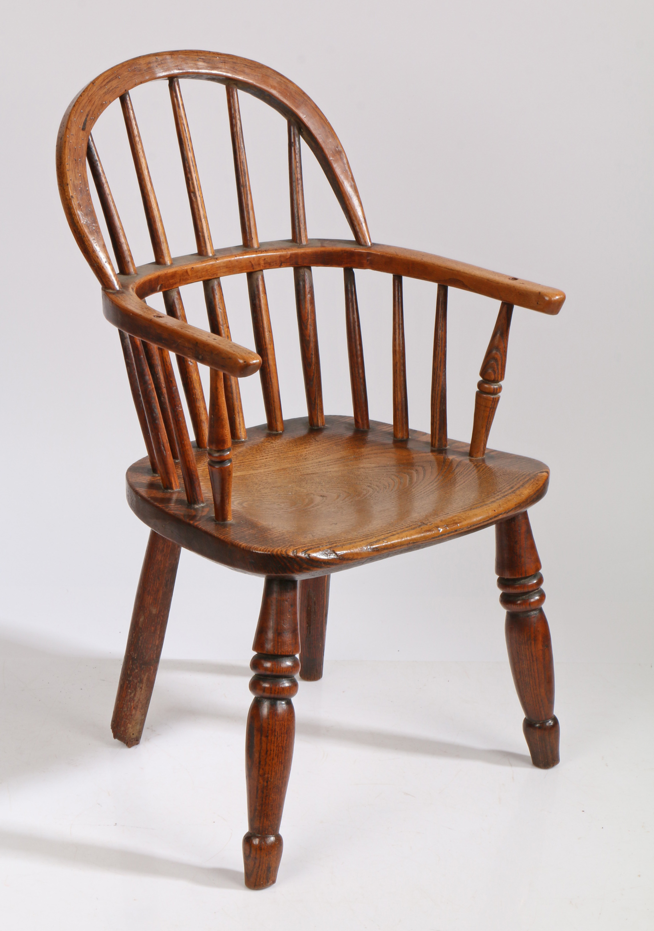 A 19th Century child's ash and oak Windsor armchair, the arched top rail above spindles and a shaped - Bild 2 aus 2