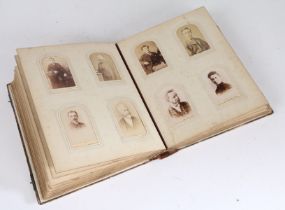 A Victorian Mother of pearl and abalone photograph album, enclosing many Victorian photographs,