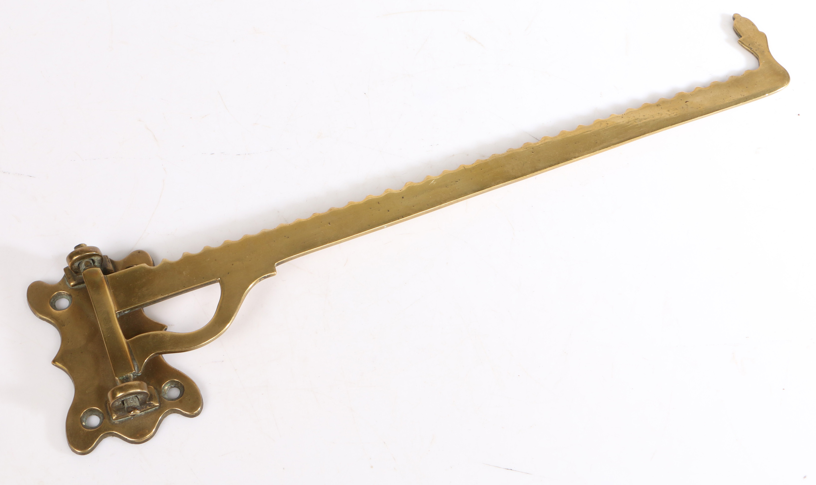 An 18th Century brass chimney crane, with an acorn shaped finial end, 36cm long