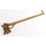 An 18th Century brass chimney crane, with an acorn shaped finial end, 36cm long