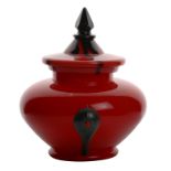 A Loetz Bohemian glass pot and cover, circa 1915, the red covered pot with black finial and three