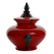 A Loetz Bohemian glass pot and cover, circa 1915, the red covered pot with black finial and three