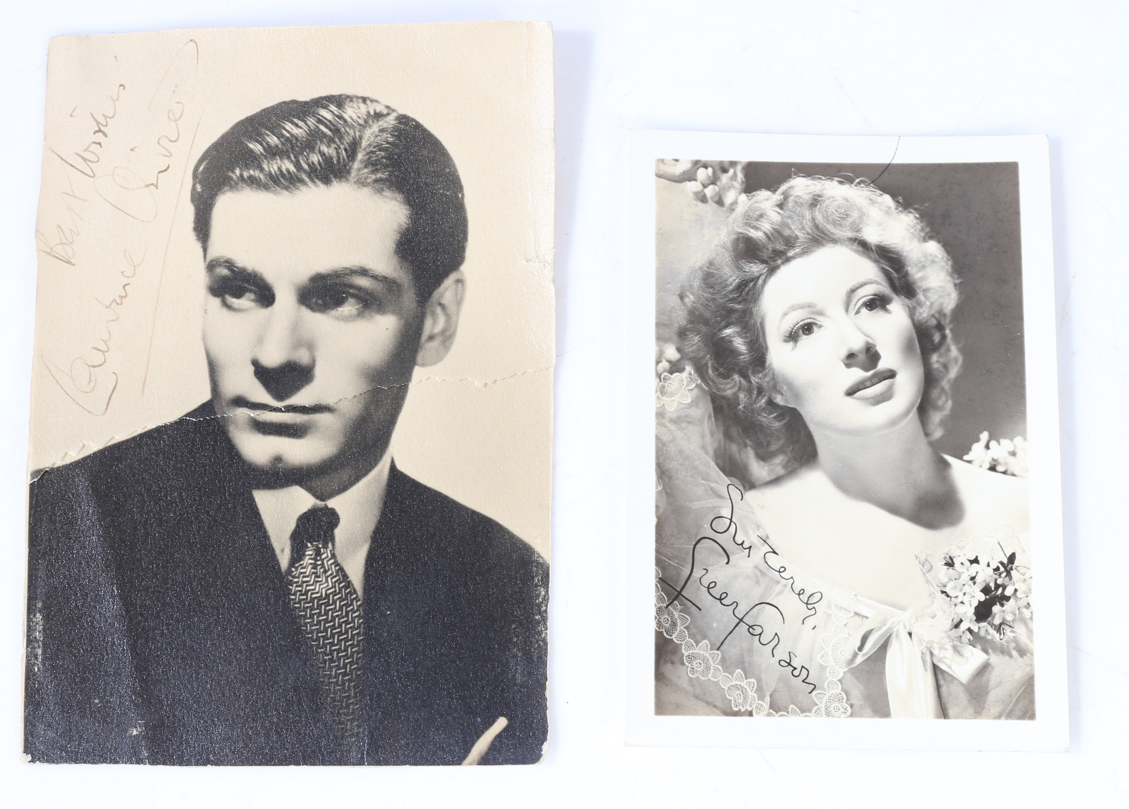Laurence Olivier / Greer Garson. Two reproduction photographs, autographed by the film stars who