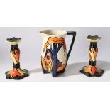 Lorna Bailey Ceramics. "Chetwynd" pattern jug and candlesticks. (3)