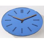 A mid century wall clock, the blue mirrored dial with baton markers and a Garrod movement, 30cm