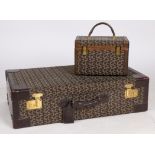 A vintage Celine "C" Macadam pattern, canvas and leather suitcase, together with vanity box.