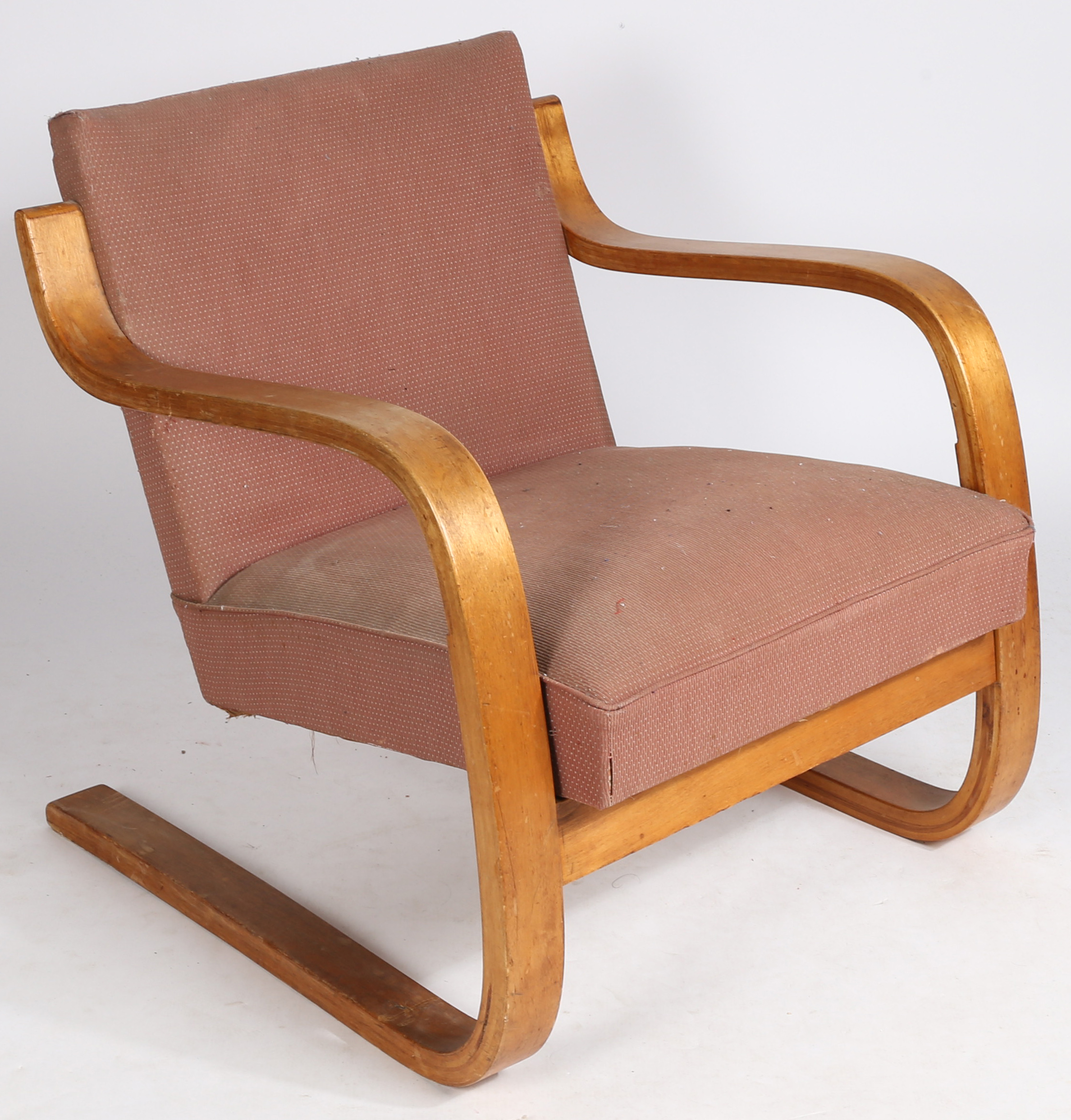 Alvar Aalto (Finnish 1898-1976) birch and upholstered armchair, retailers label rubbed but