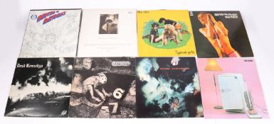 A collection of 10 LPs/ 12" singles. Pixies / The Cure / The Slits / Iggy / Dead Kennedys / etc.