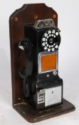 A circa 1970s American, multi coin operated pay phone, made by Western Electric for the Bell System.