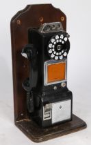 A circa 1970s American, multi coin operated pay phone, made by Western Electric for the Bell System.