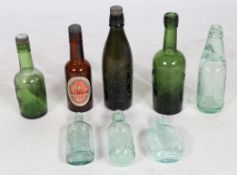 A collection of often brewery/ pub related glass bottles of various sizes. To include Guinness,