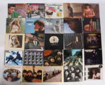 A collection of assorted LPs and 45s. To include The Beatles – Abbey Road (PCS 7088, misprint,