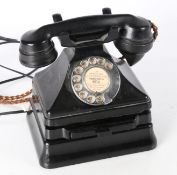 A vintage GPO Bakelite PL36/ 234 No. 164 telephone in black, with fitted index drawer. No.1/ 232 (