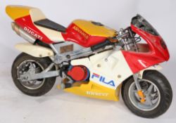 Mini Moto, scaled down petrol racing bike, in yellow, white and red with decals, Guang Le 110/50-5.5