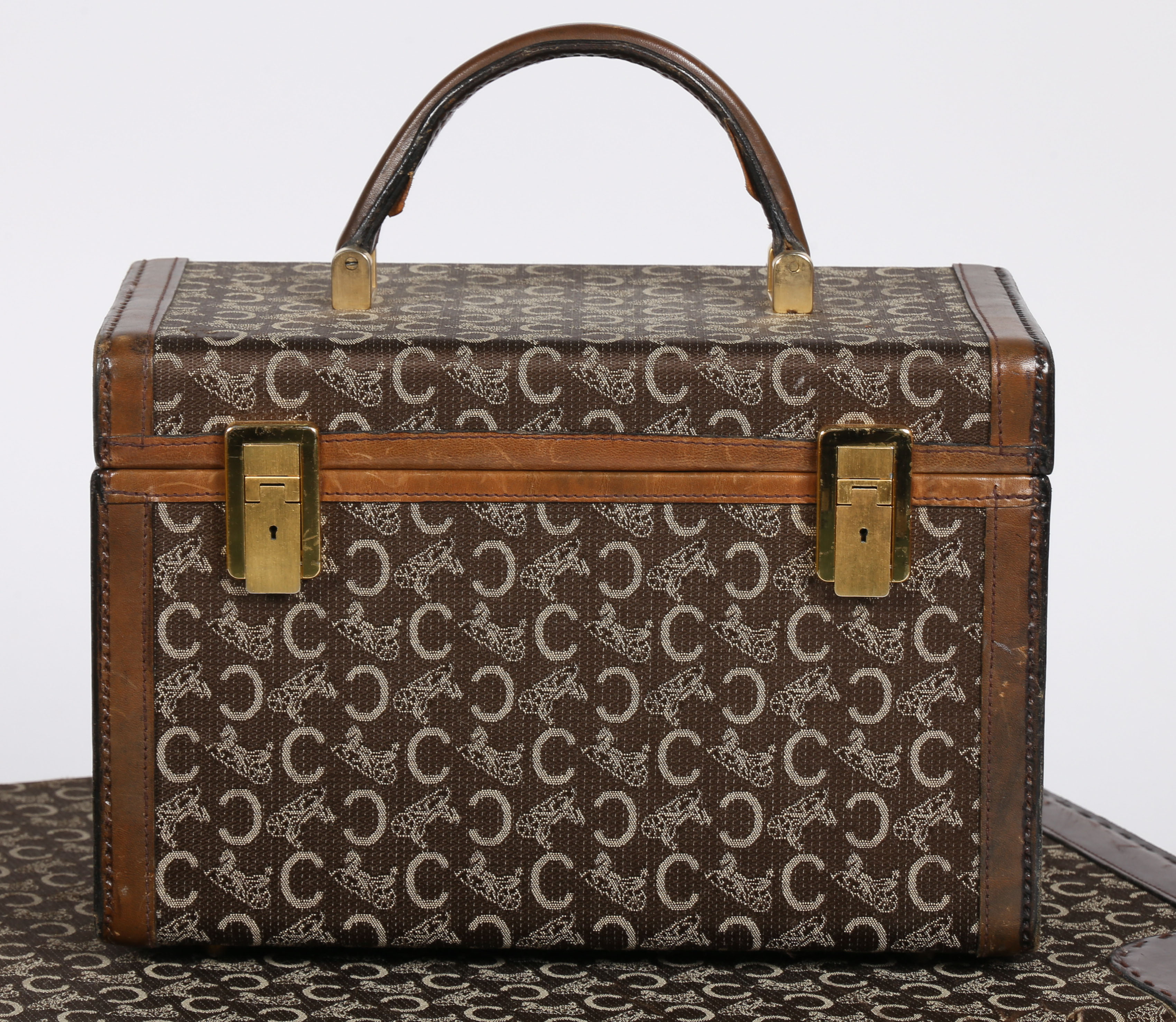 A vintage Celine "C" Macadam pattern, canvas and leather suitcase, together with vanity box. - Image 2 of 9