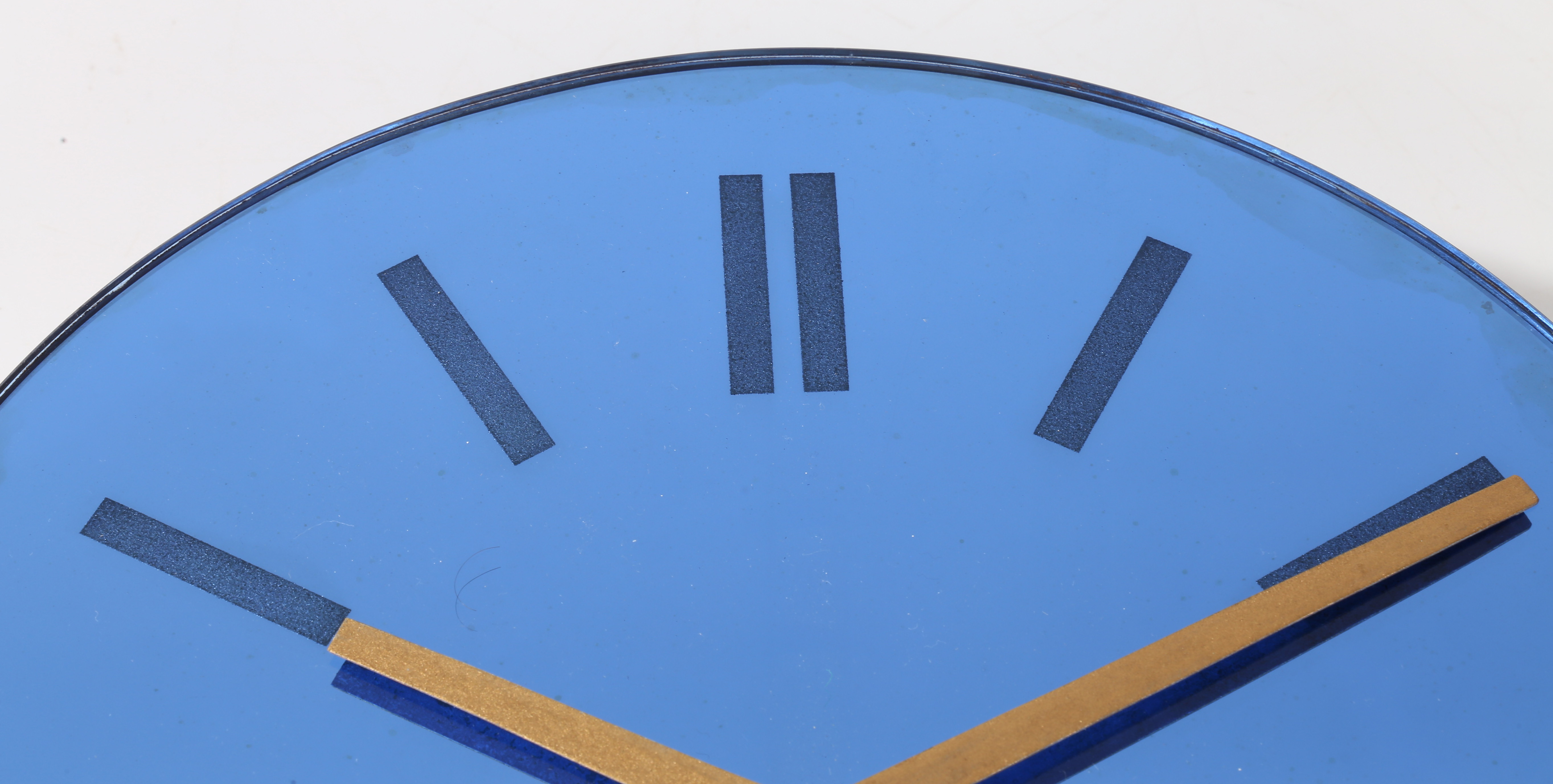 A mid century wall clock, the blue mirrored dial with baton markers and a Garrod movement, 30cm - Image 4 of 4