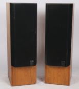 A pair of KEF 104/2 speakers with original packaging.