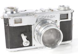 Zeiss Ikon Contax 35mm camera with a Carl Zeiss Sonnar 1:2 lens, in a carrying case and