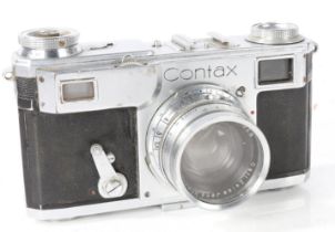 Zeiss Ikon Contax 35mm camera with a Carl Zeiss Sonnar 1:2 lens, in a carrying case and