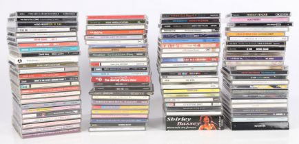 A large collection of assorted CDs, spanning many genres. Albums, singles, promos, box sets, etc..