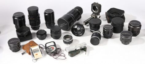 A collection of cameras, camera lenses and accessories. To include a Minox 35GT, Rollei 35,