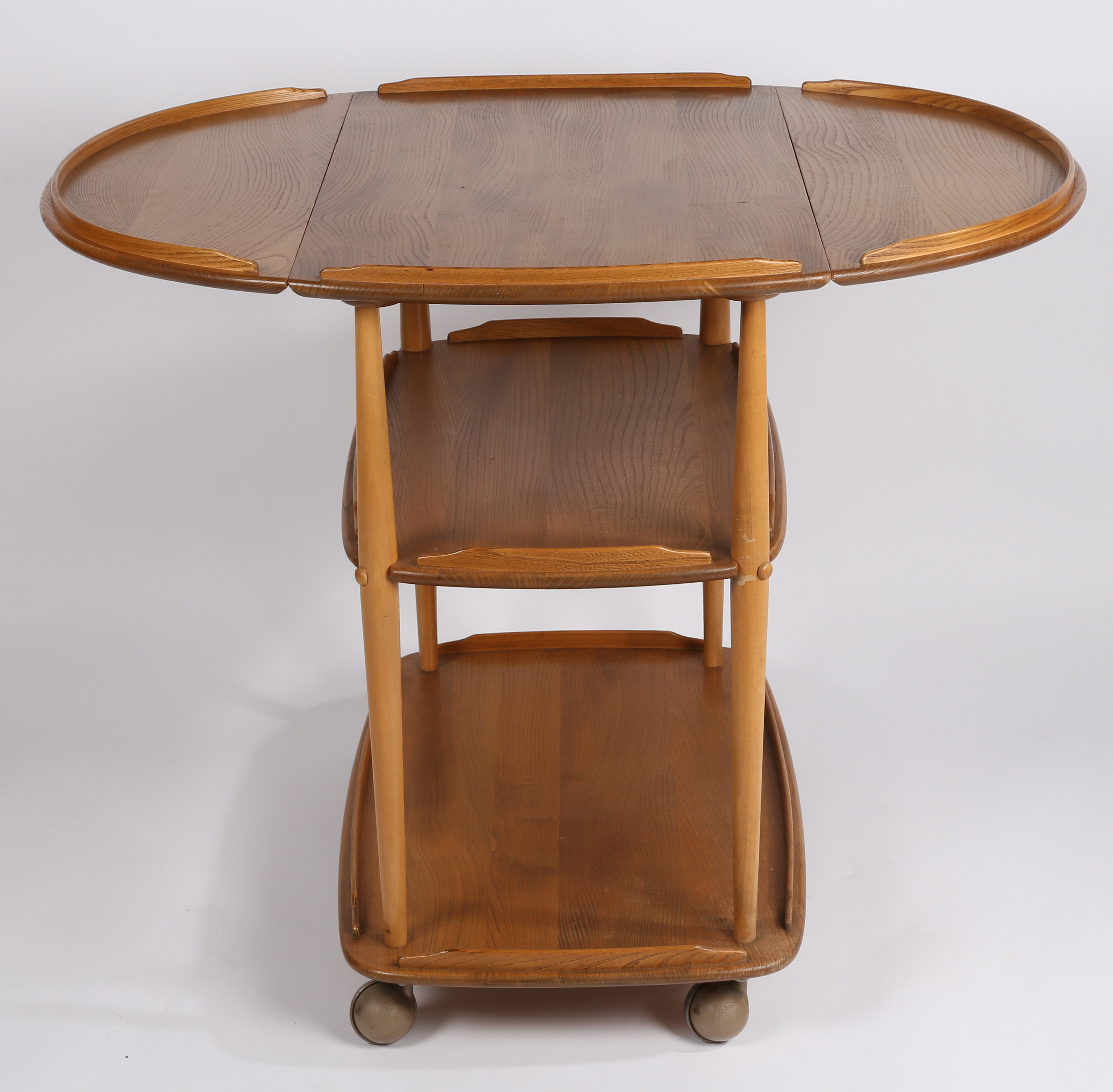 Ercol beech and elm three tier drop leaf serving trolley on castors, 77cm high, 75cm length, 96cm - Image 3 of 4