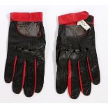 A pair of 1960's Graham Hill leather driving gloves, the red and black leather gloves with velcro