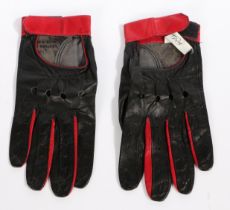 A pair of 1960's Graham Hill leather driving gloves, the red and black leather gloves with velcro