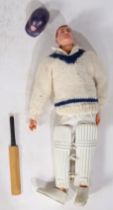 Vintage Palitoy Action Man Cricketer, painted head/ face with bat, helmet, and pads.